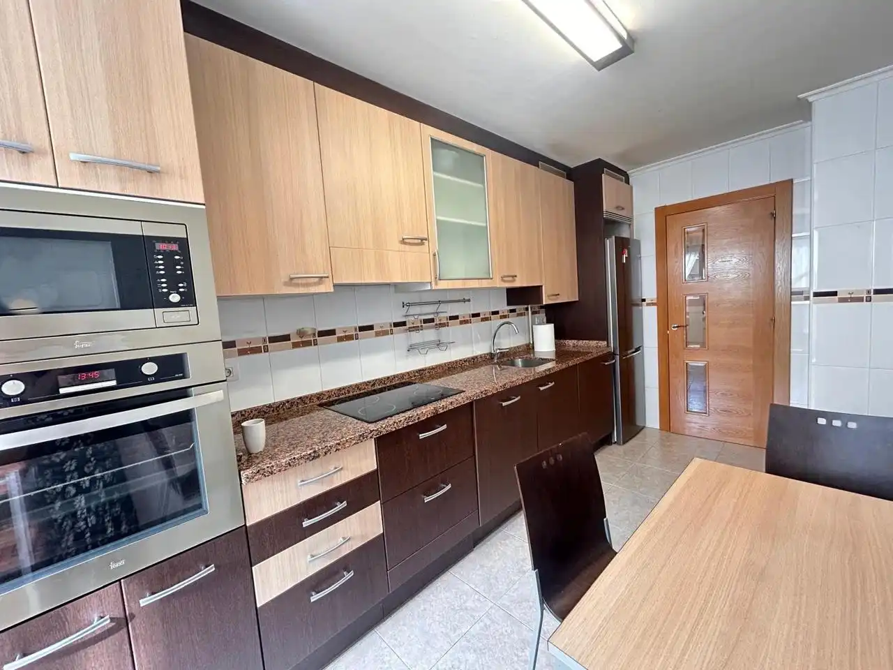 Kitchen of Flat for rent in Gijón   with Heating, Storage room and Furnished