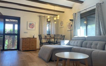 Sala d'estar de Casa adosada en venda en Dénia amb Aire condicionat, Jardí privat i Terrassa