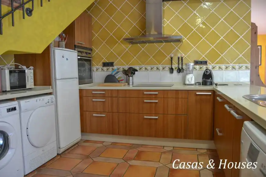 Cuina de Casa o xalet en venda en La Manga del Mar Menor amb Jardí privat, Terrassa i Moblat