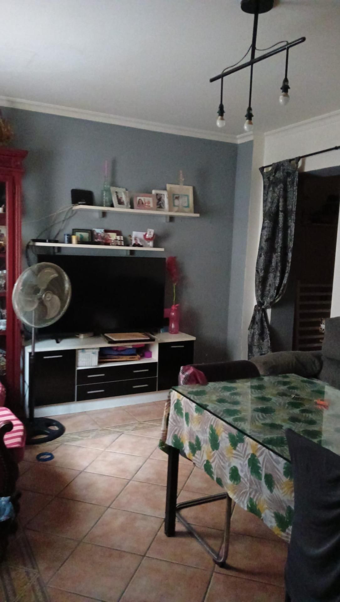 Sala d'estar de Casa adosada en venda en  Sevilla Capital amb Aire condicionat, Terrassa i Traster