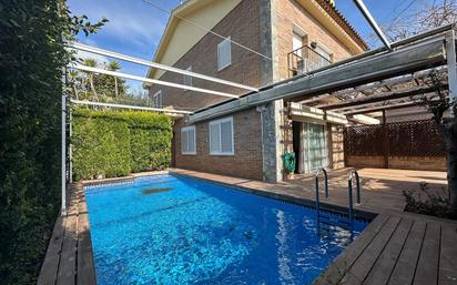 Swimming pool of House or chalet for sale in Pineda de Mar  with Air Conditioner, Heating and Private garden