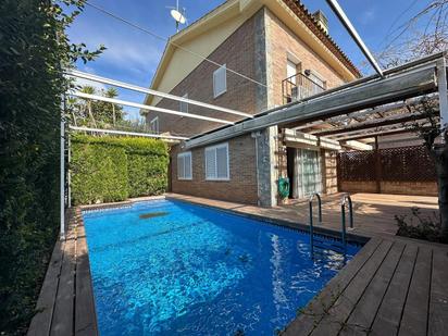 Swimming pool of House or chalet for sale in Pineda de Mar  with Air Conditioner, Heating and Private garden