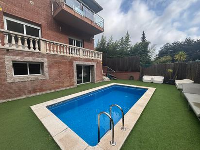 Swimming pool of House or chalet for sale in Alella  with Air Conditioner, Heating and Private garden