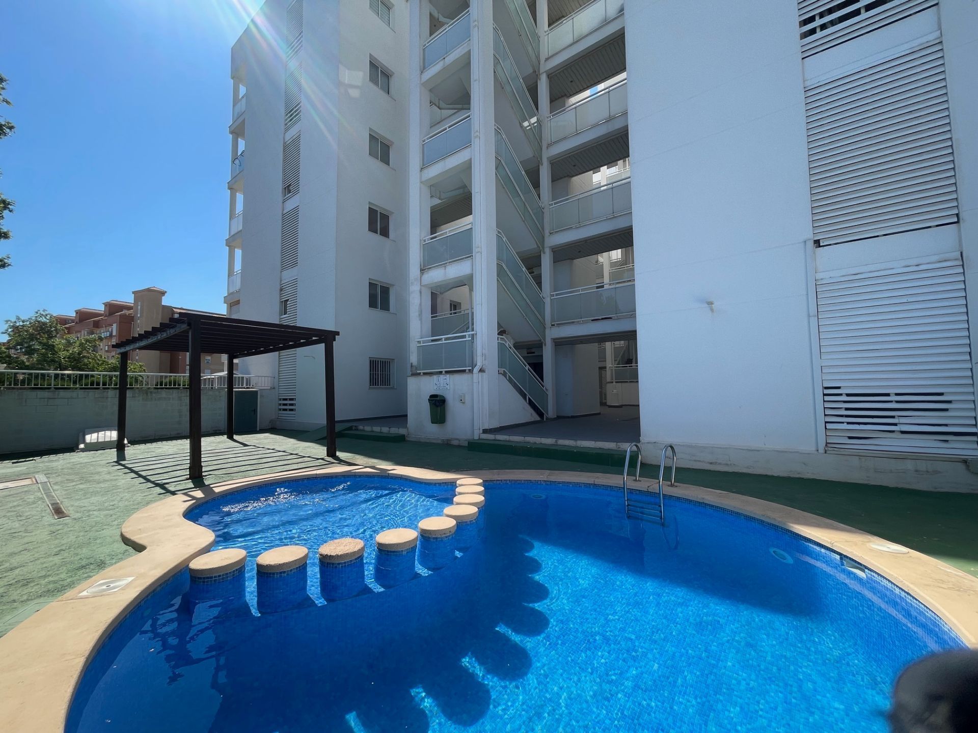 Swimming pool of Flat for sale in Dénia  with Air Conditioner, Terrace and Community pool