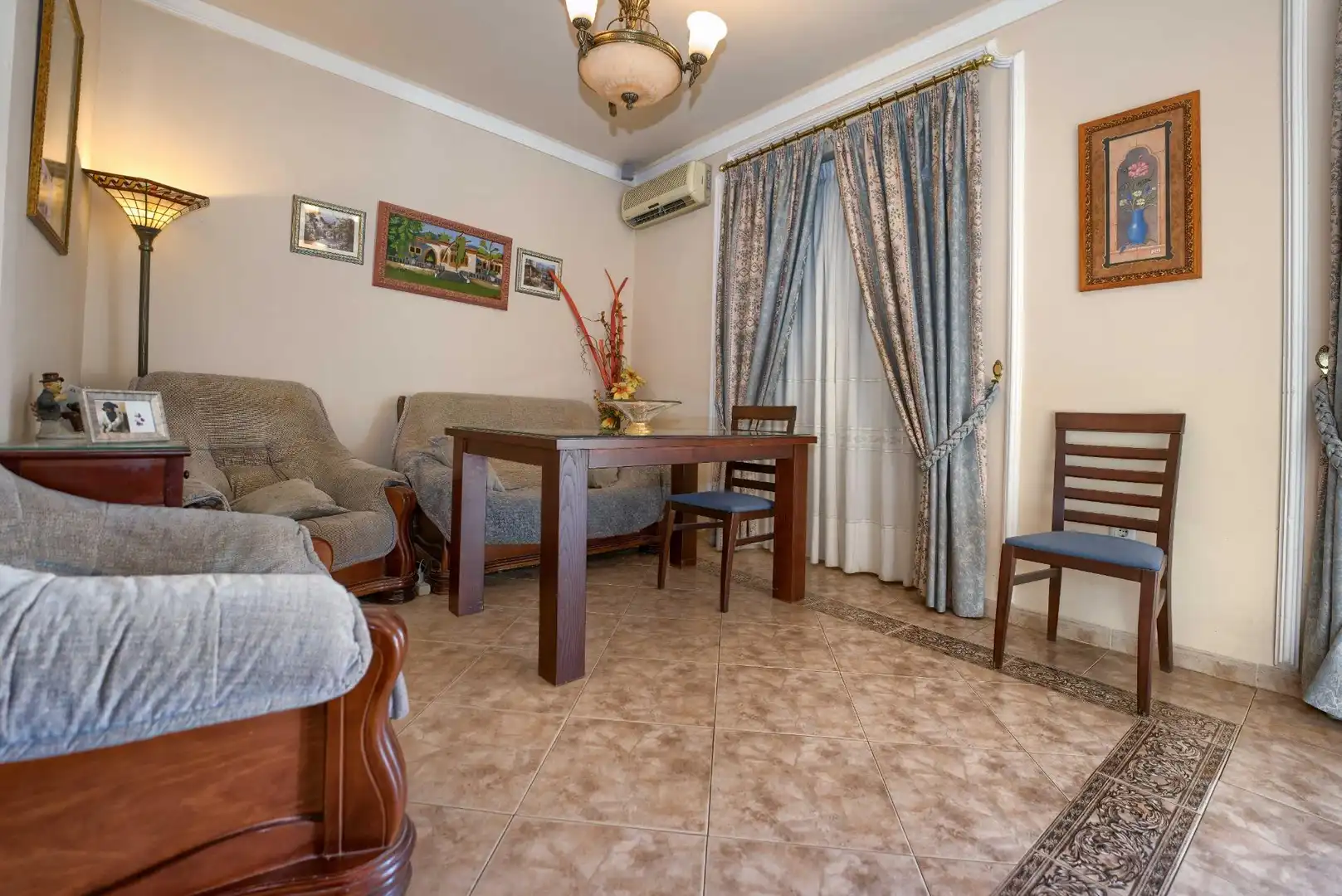 Sala de estar de Casa adosada en venta en La Palma del Condado con Aire acondicionado, Calefacción y Terraza