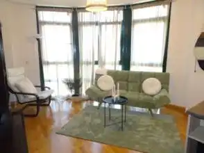 Sala de estar de Dúplex de alquiler en Gijón  con Calefacción, Parquet y Amueblado