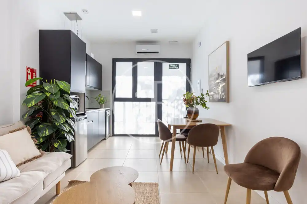 Sala d'estar de Loft de lloguer en Valencia amb Aire condicionat i Moblat
