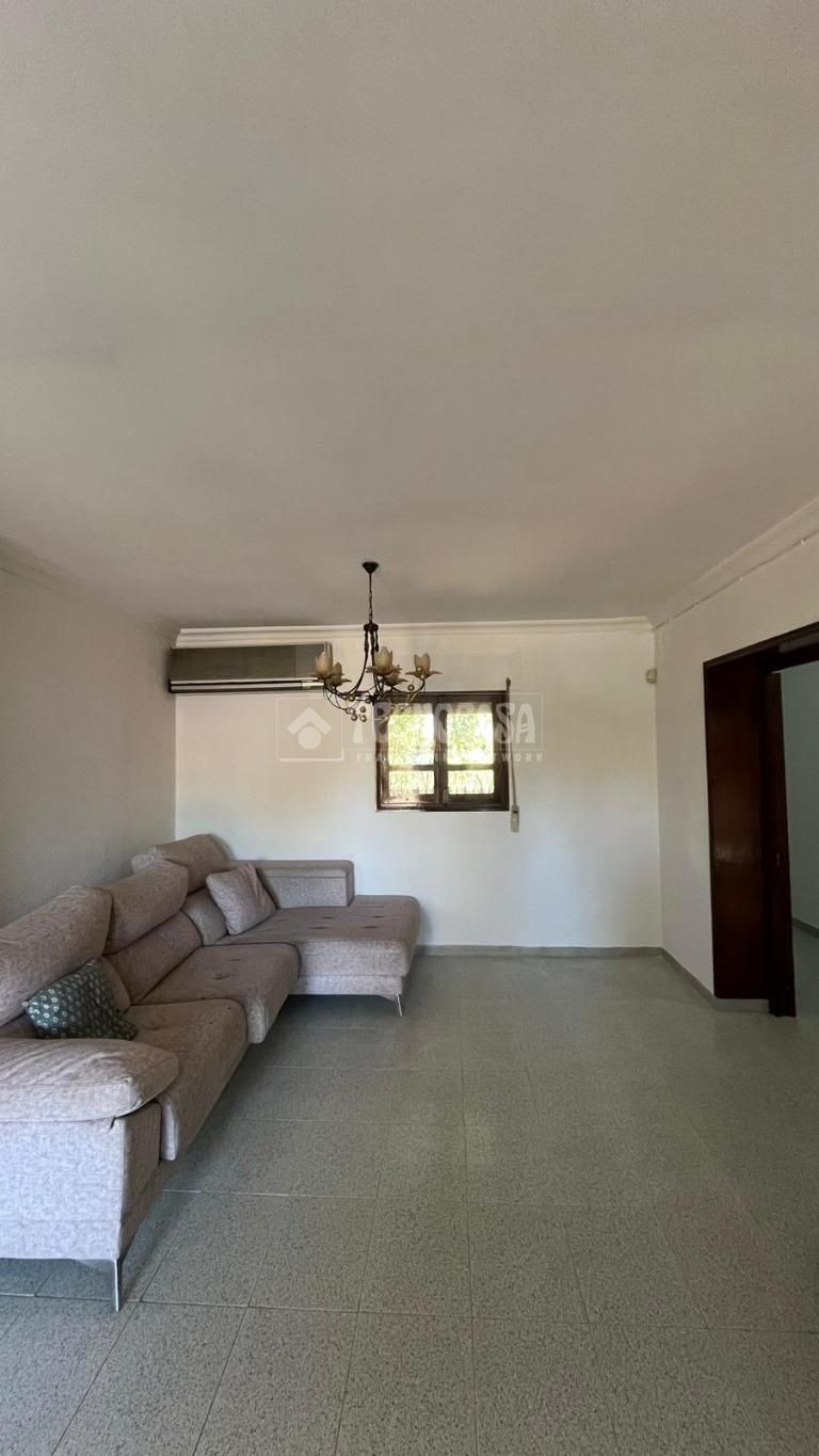 Living room of House or chalet for sale in Mairena del Alcor  with Air Conditioner