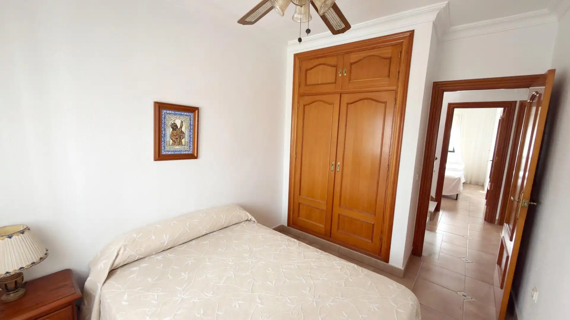 Habitación de Casa adosada de alquiler en Punta Umbría con Terraza y Piscina comunitaria