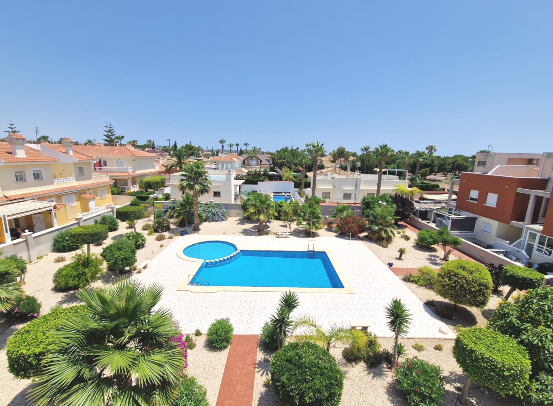 Swimming pool of Single-family semi-detached for sale in Rojales  with Terrace, Storage room and Community pool