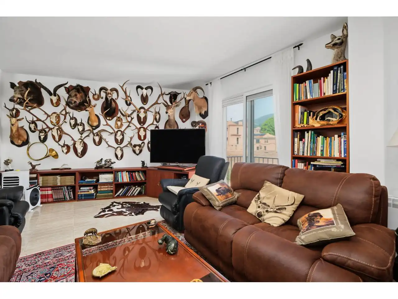 Sala de estar de Piso en venta en Maçanet de Cabrenys con Calefacción, Terraza y Balcón