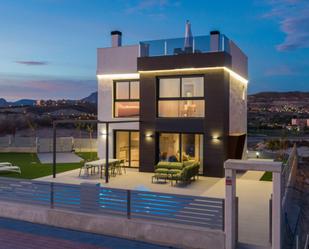 Vista exterior de Casa o xalet en venda en Sant Joan d'Alacant amb Terrassa i Piscina comunitària