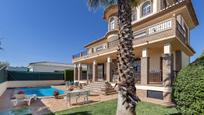 Exterior view of House or chalet for sale in Cúllar Vega  with Air Conditioner, Heating and Private garden