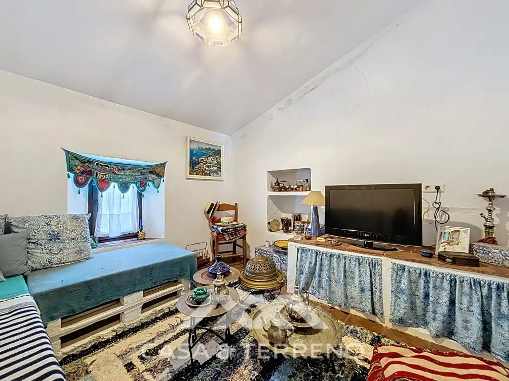 Sala d'estar de Casa o xalet en venda en Comares amb Aire condicionat, Jardí privat i Terrassa