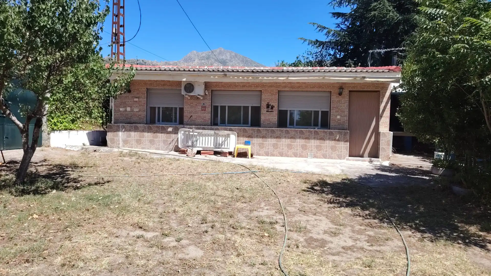 Vista exterior de Casa o chalet en venta en El Boalo - Cerceda – Mataelpino con Jardín privado, Piscina y Amueblado