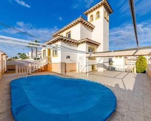 Vista exterior de Casa o xalet en venda en Orihuela amb Aire condicionat, Calefacció i Jardí privat