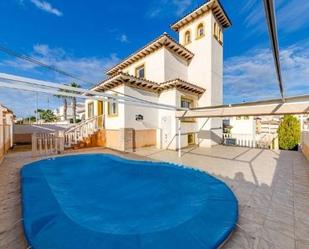 Exterior view of House or chalet for sale in Orihuela  with Air Conditioner, Heating and Private garden