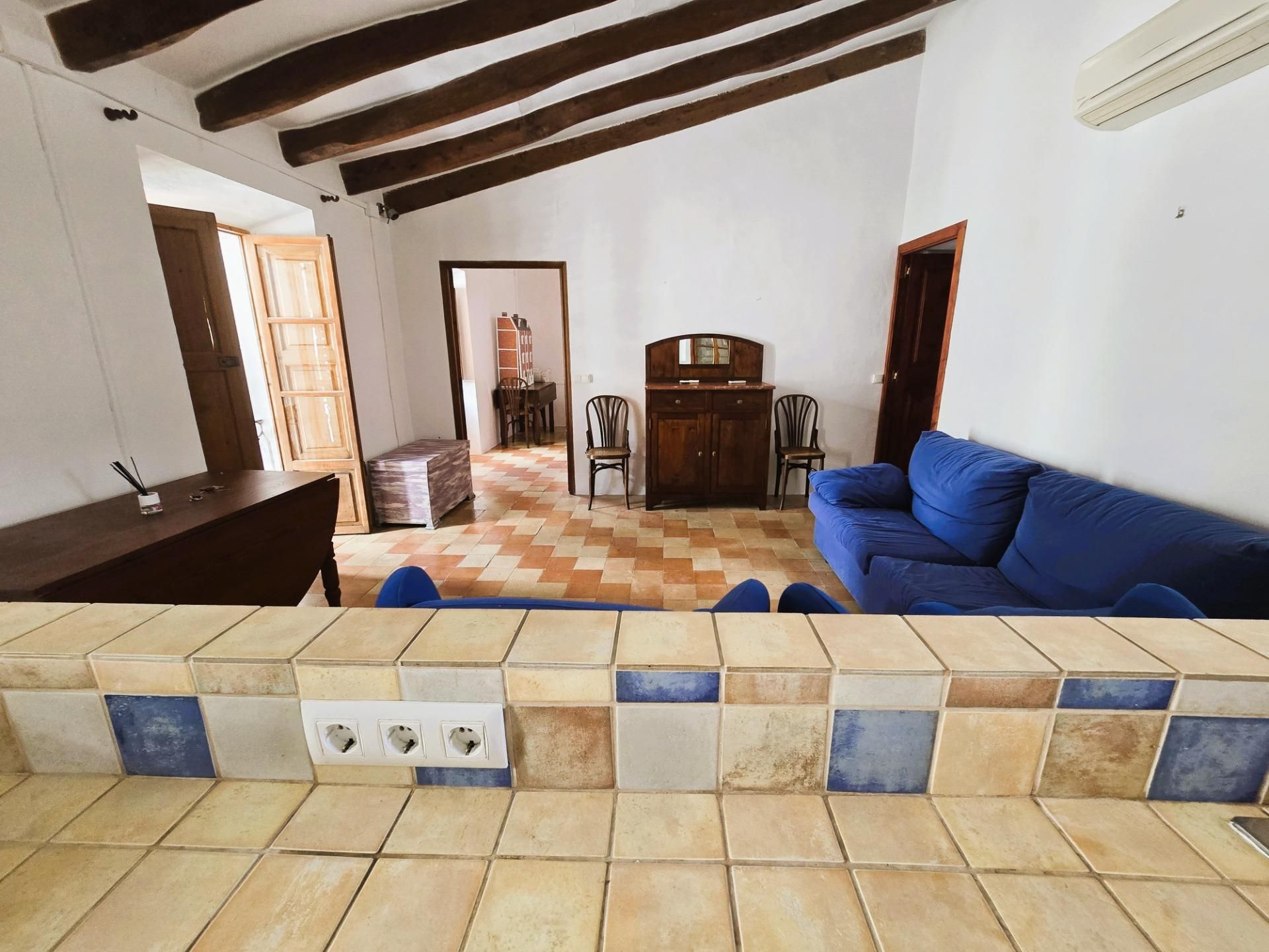 Sala d'estar de Casa o xalet en venda en Calvià amb Calefacció, Jardí privat i Terrassa
