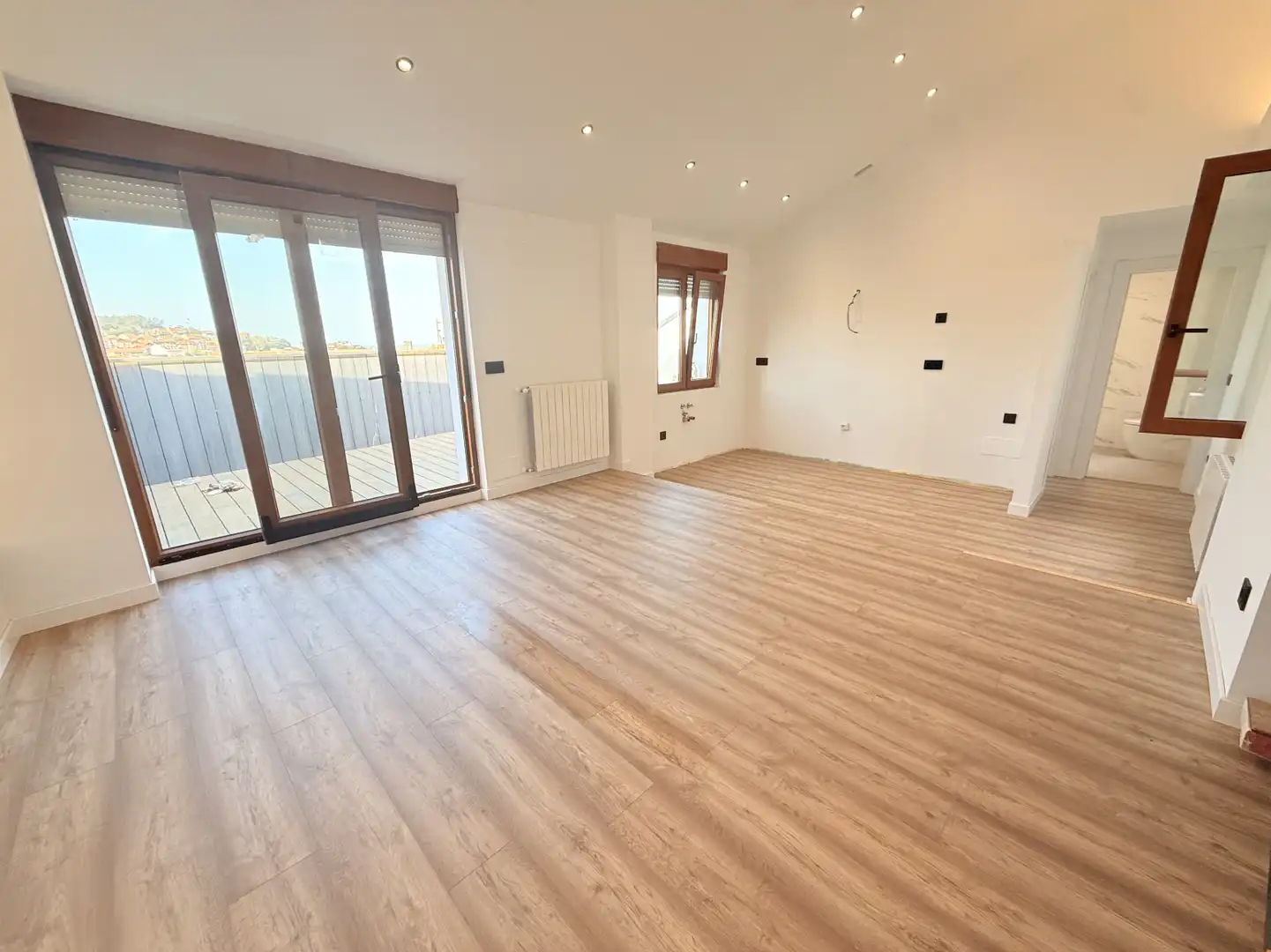 Sala de estar de Piso en venta en San Vicente de la Barquera con Calefacción y Terraza