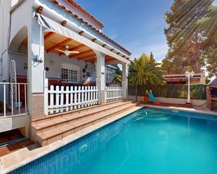 Swimming pool of Single-family semi-detached for sale in Torrent  with Air Conditioner, Heating and Private garden