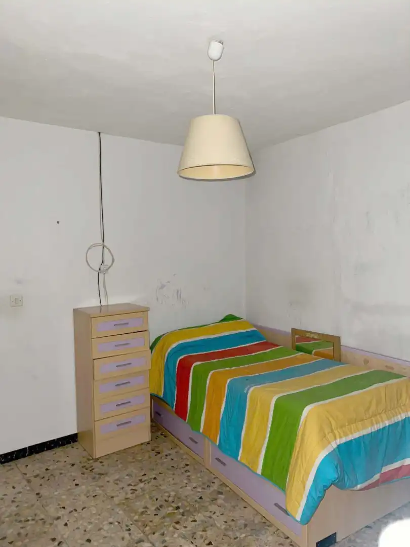 Dormitori de Casa adosada en venda en Higuera la Real amb Terrassa i Moblat