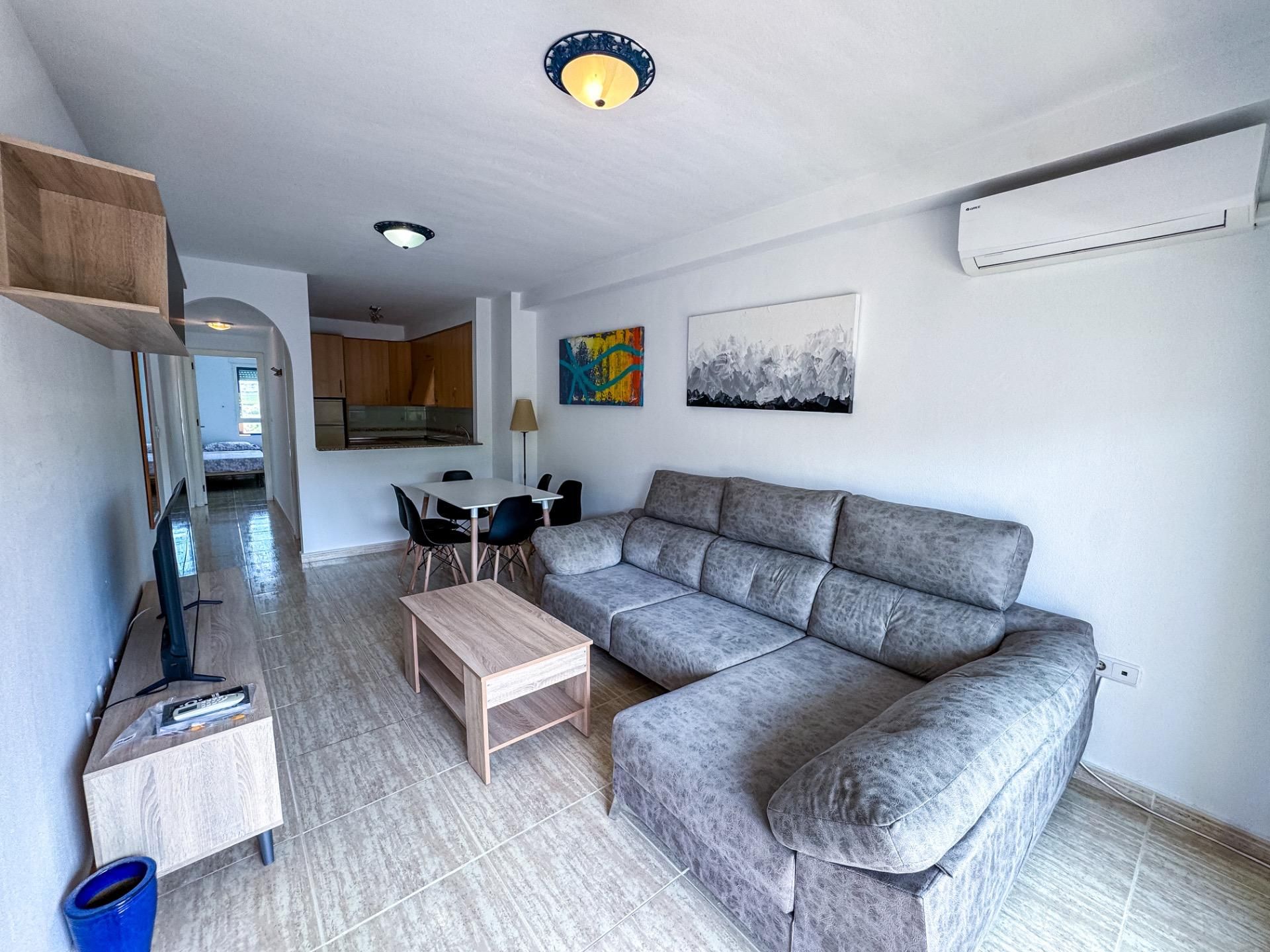 Living room of Flat for sale in Orihuela  with Air Conditioner, Private garden and Community pool