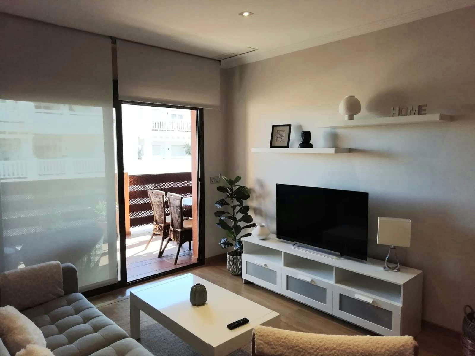 Living room of Flat to rent in Motril  with Air Conditioner, Heating and Parquet flooring