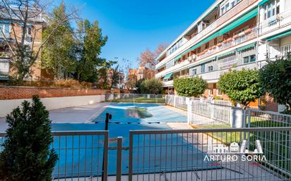 Swimming pool of Flat for sale in  Madrid Capital  with Heating, Parquet flooring and Oven