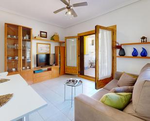 Living room of Planta baja for sale in Torrevieja  with Air Conditioner, Terrace and Balcony