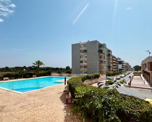 Swimming pool of Apartment for sale in Torrevieja  with Air Conditioner, Heating and Terrace