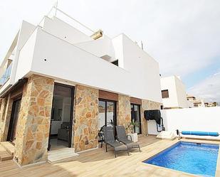 Exterior view of Single-family semi-detached for sale in Orihuela  with Air Conditioner, Terrace and Swimming Pool