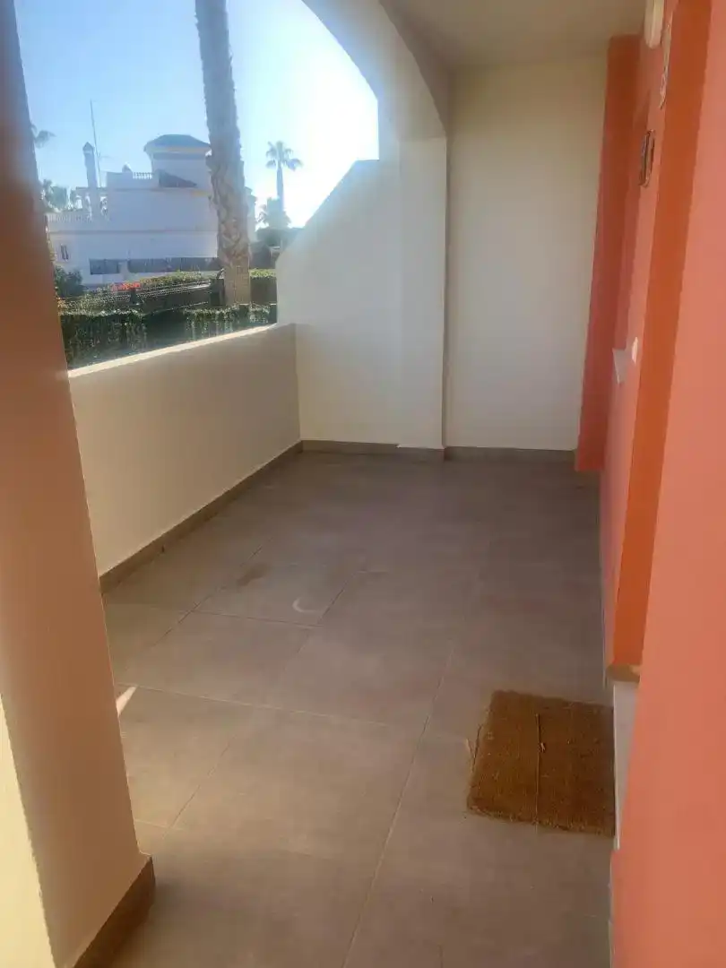 Terraza de Piso de alquiler en Vera con Aire acondicionado, Jardín privado y Piscina