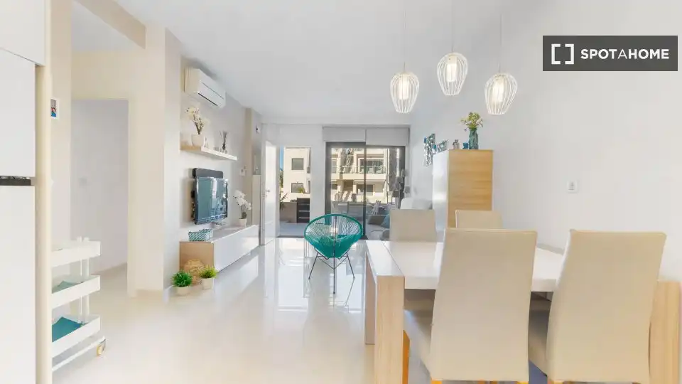 Sala d'estar de Apartament per a compartir en Pilar de la Horadada amb Aire condicionat, Terrassa i Moblat