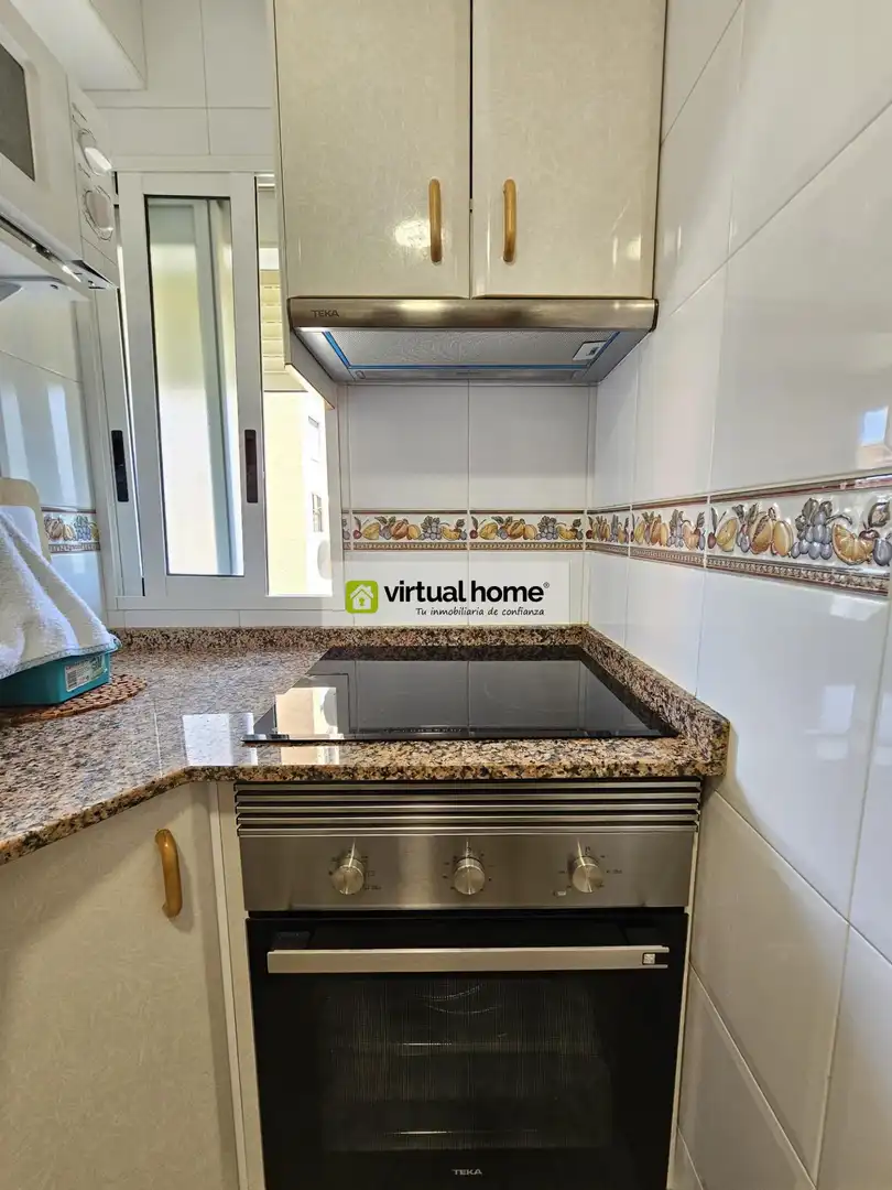 Kitchen of Flat for sale in Benidorm  with Air Conditioner, Terrace and Furnished