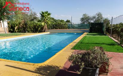 Swimming pool of House or chalet for sale in Almodóvar del Río  with Air Conditioner and Swimming Pool