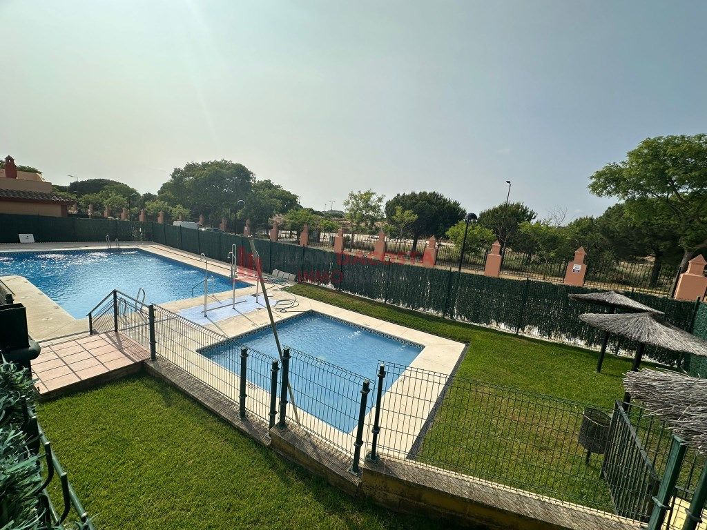 Swimming pool of Duplex for sale in Islantilla