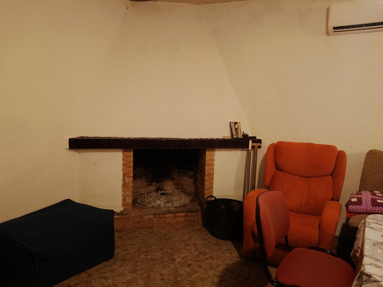 Sala d'estar de Casa o xalet en venda en  Córdoba Capital amb Aire condicionat i Piscina