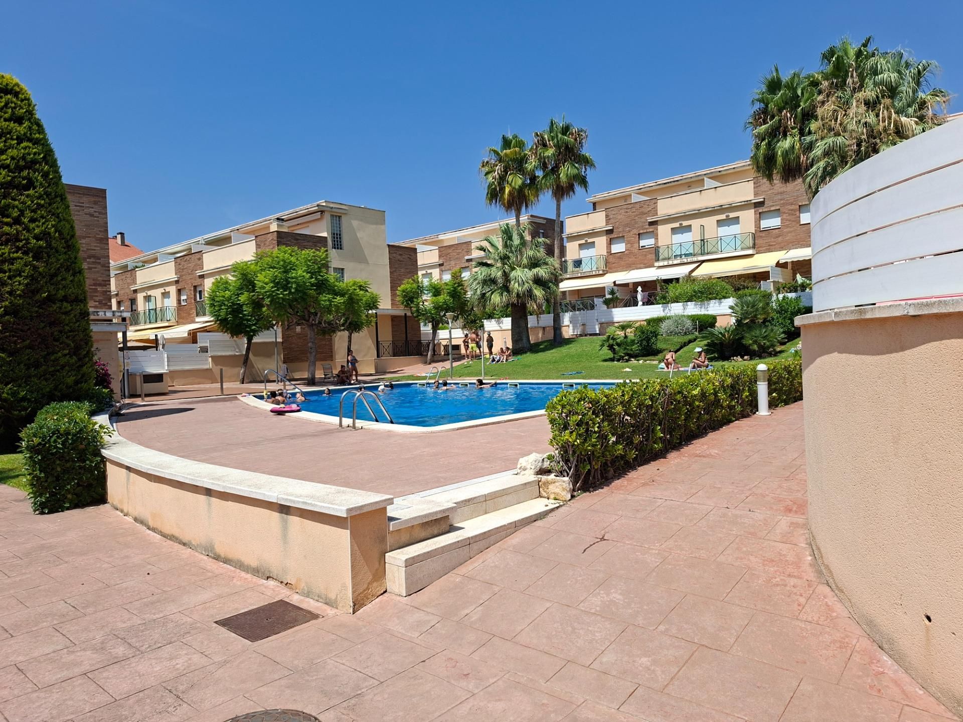 Swimming pool of Single-family semi-detached for sale in Calafell  with Air Conditioner, Heating and Private garden