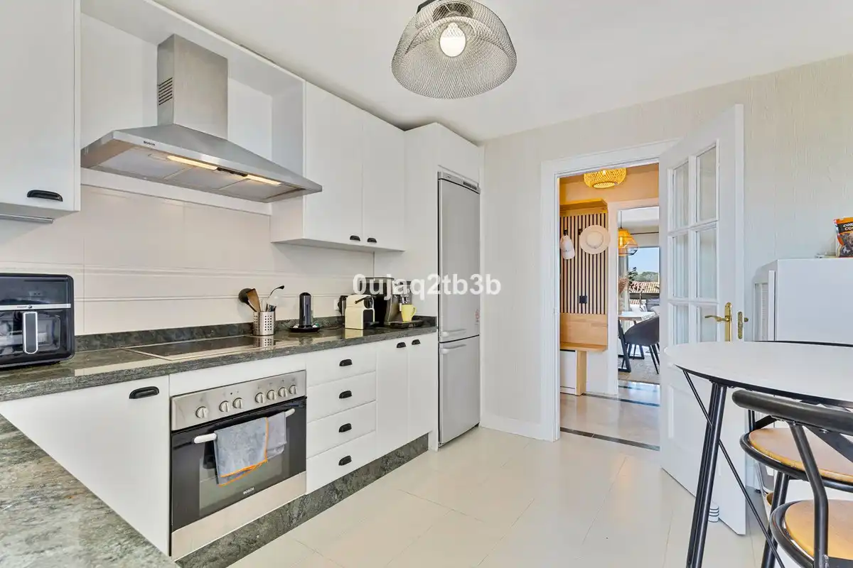 Kitchen of Apartments for sale in Marbella  with Air Conditioner, Alarm and Community pool