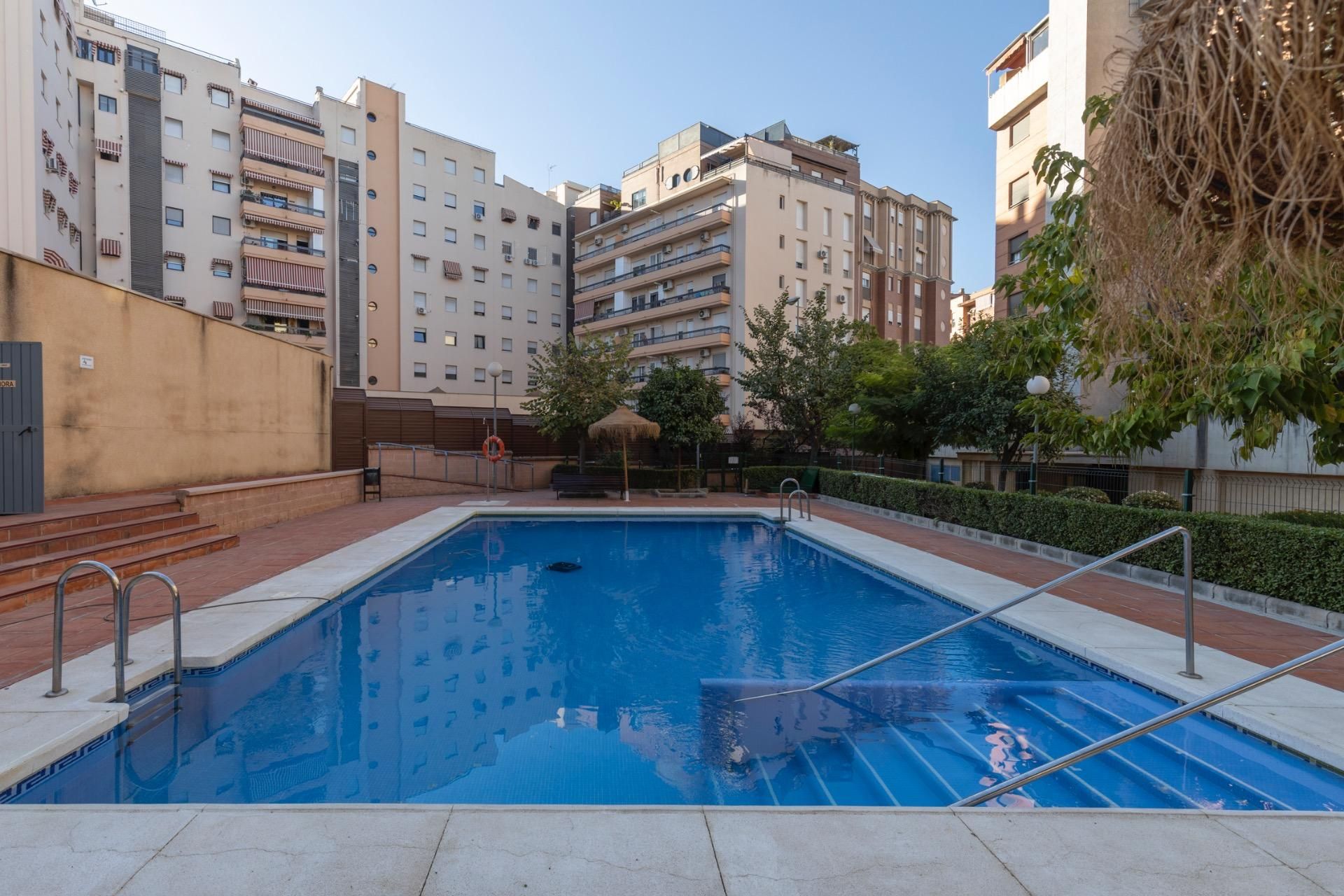 Swimming pool of Flat for sale in  Granada Capital  with Air Conditioner, Heating and Community pool