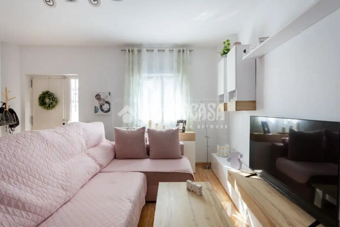 Sala de estar de Casa adosada en venta en Vélez-Málaga con Terraza