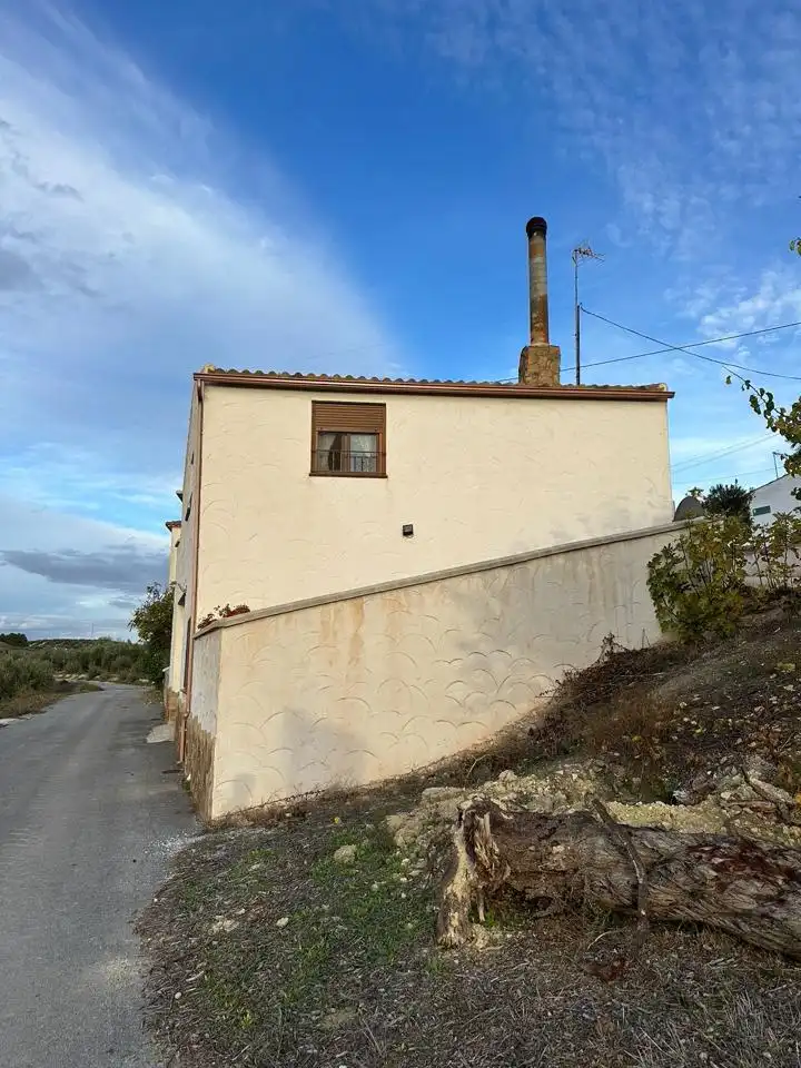 Vista exterior de Casa o xalet en venda en Cuevas del Campo amb Aire condicionat, Jardí privat i Traster
