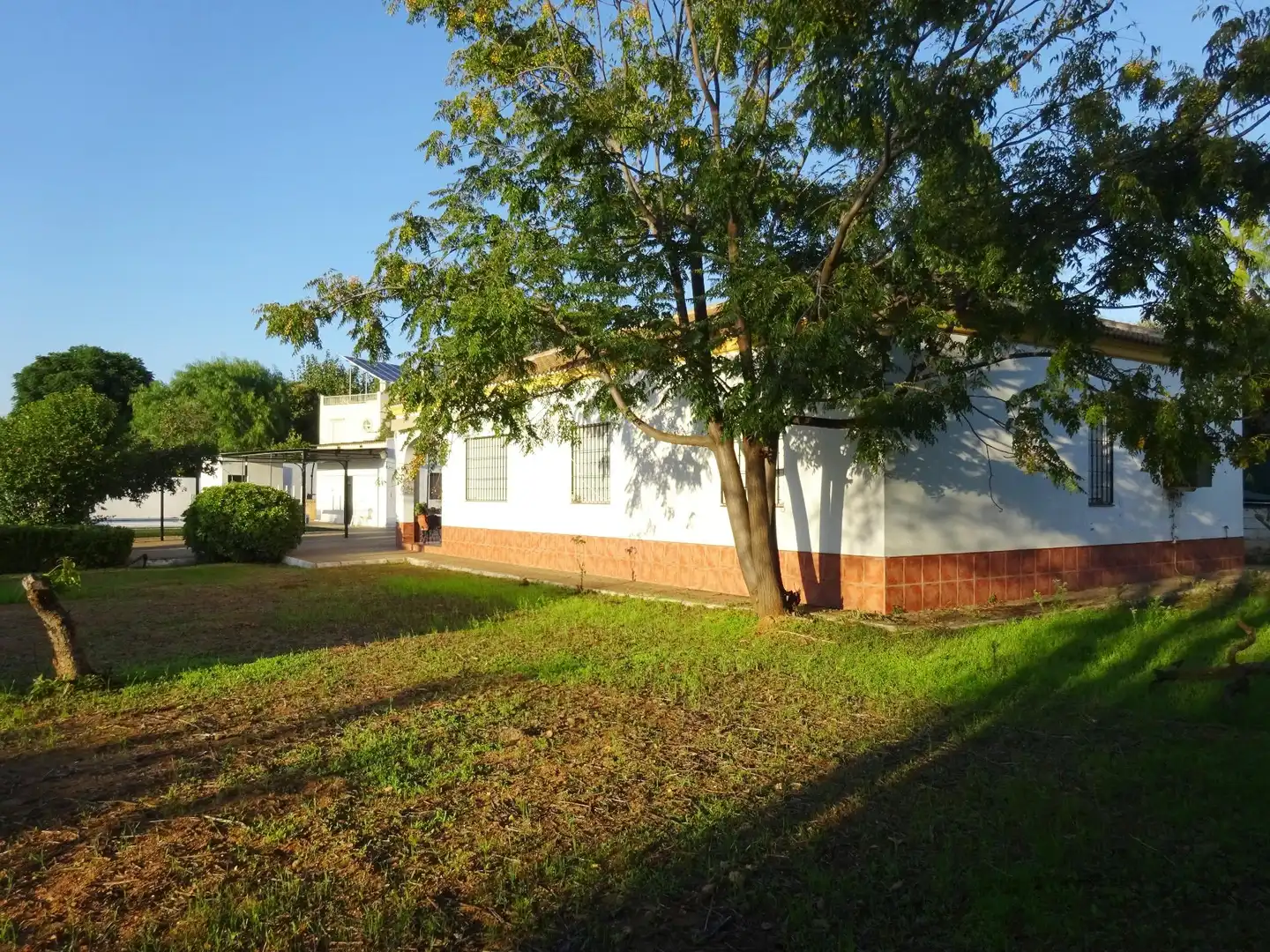 Exterior view of Houses for sale in Sanlúcar la Mayor  with Air Conditioner, Private garden and Storage room