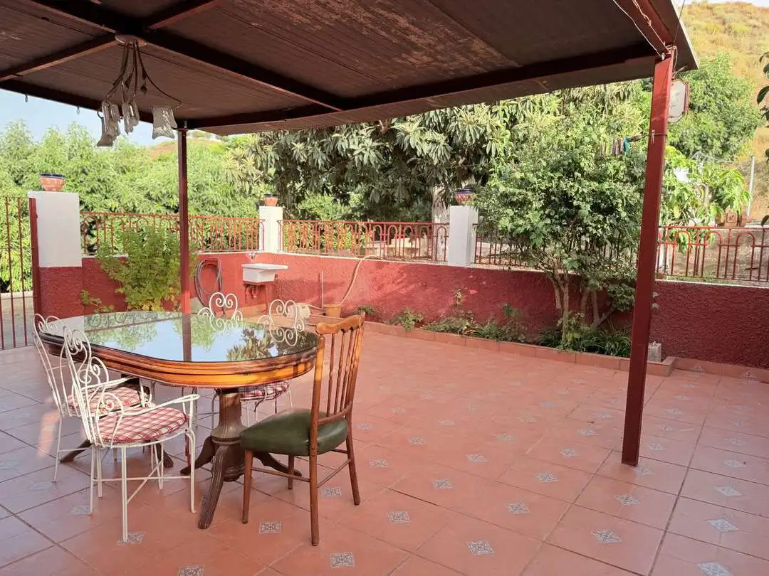Terrassa de Casa o xalet en venda en Benamocarra amb Jardí privat i Moblat