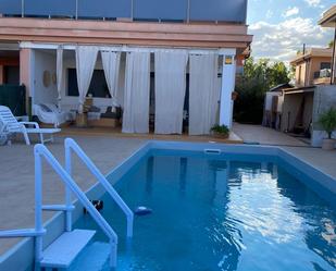 Swimming pool of Single-family semi-detached for sale in L'Ampolla  with Air Conditioner, Terrace and Swimming Pool