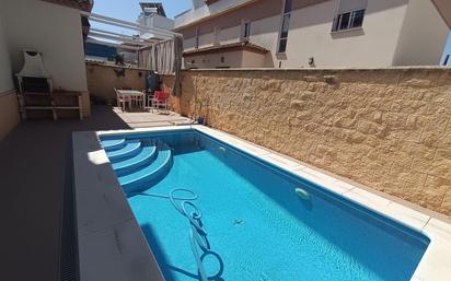 Swimming pool of Single-family semi-detached for sale in La Carlota  with Air Conditioner, Terrace and Swimming Pool