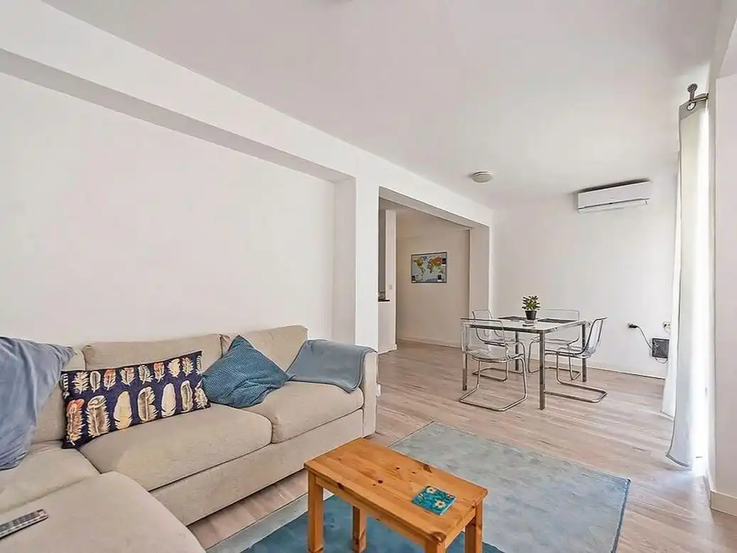 Sala de estar de Apartamento para compartir en Huelva con Aire acondicionado y Amueblado