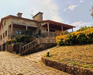 Vista exterior de Casa o xalet en venda en Sanxenxo amb Jardí privat, Terrassa i Traster