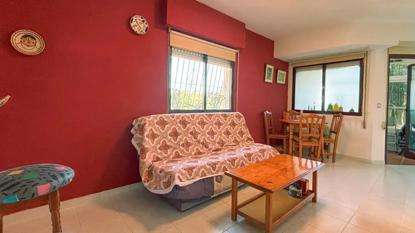 Sala d'estar de Casa adosada en venda en Santa Pola amb Aire condicionat, Jardí privat i Terrassa