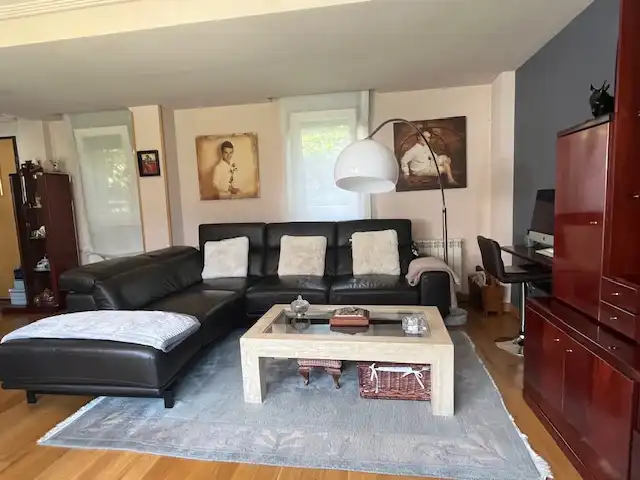 Sala d'estar de Casa adosada en venda en Santander amb Calefacció, Jardí privat i Parquet